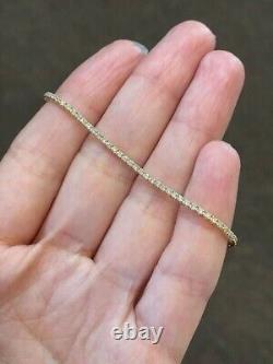 Lab Created 2Ct Round Moissanite Women's Tennis Bracelet in 14k Yellow Gold over