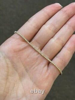 Lab Created 2Ct Round Moissanite Women's Tennis Bracelet in 14k Yellow Gold over