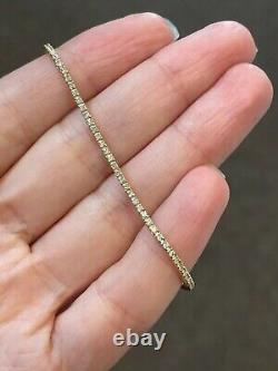 Lab Created 2Ct Round Moissanite Women's Tennis Bracelet in 14k Yellow Gold over